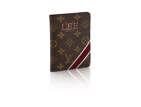 Designer Passport Cover in Monogram Canvas .